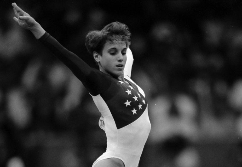 Kerri Strug competes on the floor exercise at the 1996 Olympics.