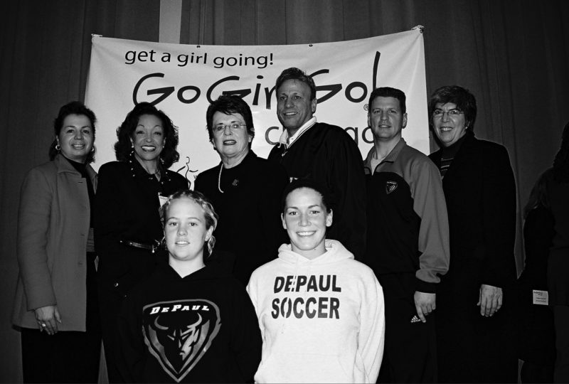 Billie Jean King with several leaders and participants in the Chicago Go Girl Go program.