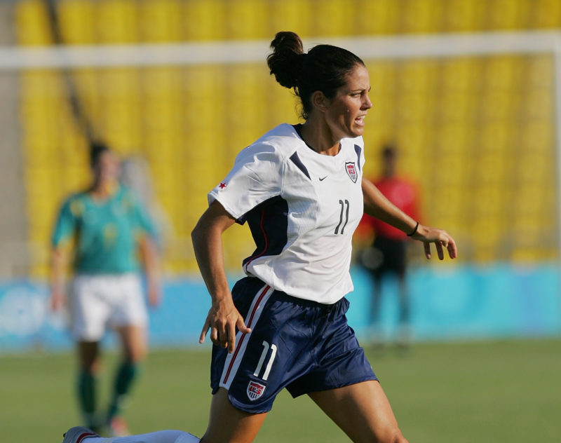 Julie Foudy playing soccer for Team USA