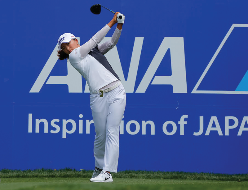 Ko Jin-Young swinging a golf club.